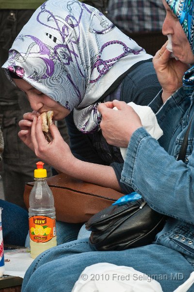 20100403_165133 D300.jpg - Lady having a snack, Eminonu Terminus